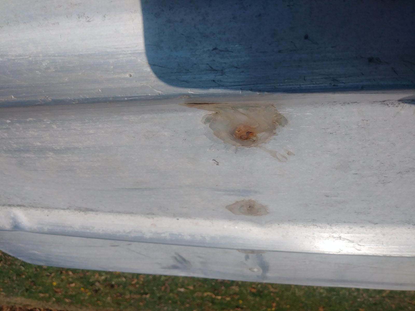 Close-up of a rust spot on the hull before repair